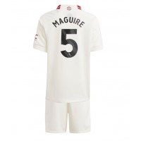 Camisa de Futebol Manchester United Harry Maguire #5 Equipamento Alternativo Infantil 2023-24 Manga Curta (+ Calças curtas)